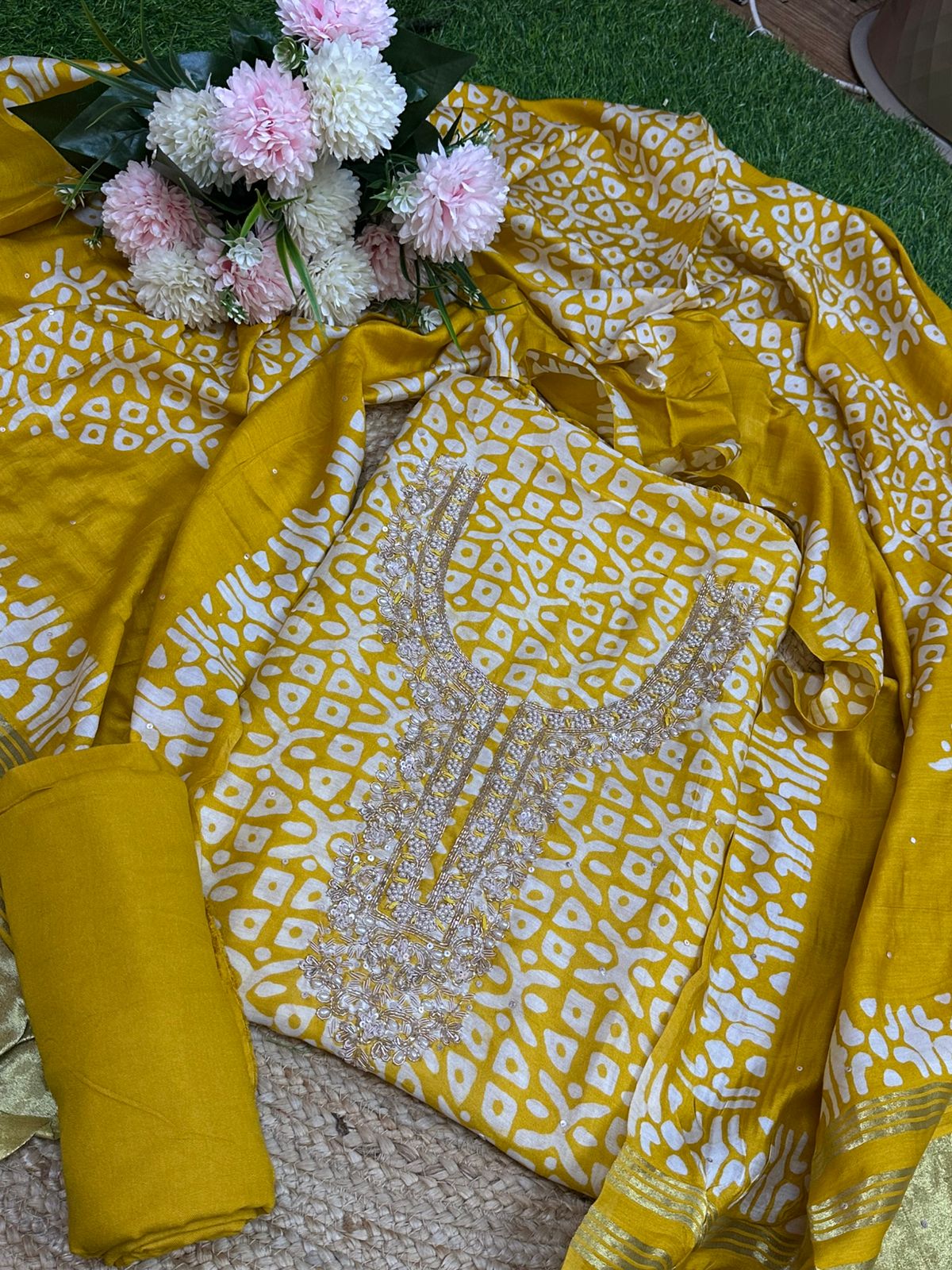 Muslin Batic print Salwar set with Handwork Neck line