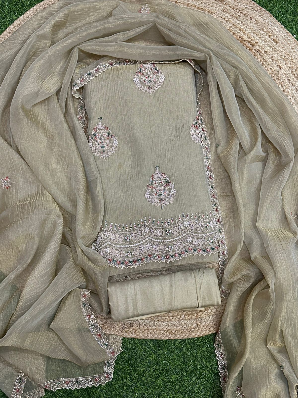 Crush Tissue salwar set with handwork on daman and buti placements allover featuring zardosi , meenakari pearls , kardana embroidery