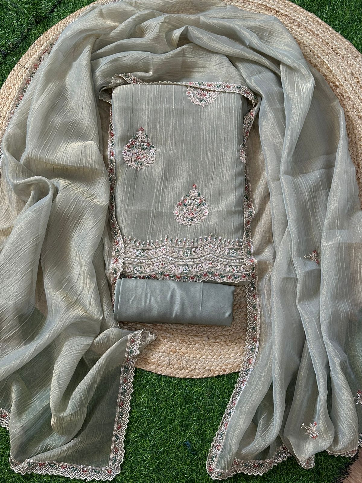 Crush Tissue salwar set with handwork on daman and buti placements allover featuring zardosi , meenakari pearls , kardana embroidery